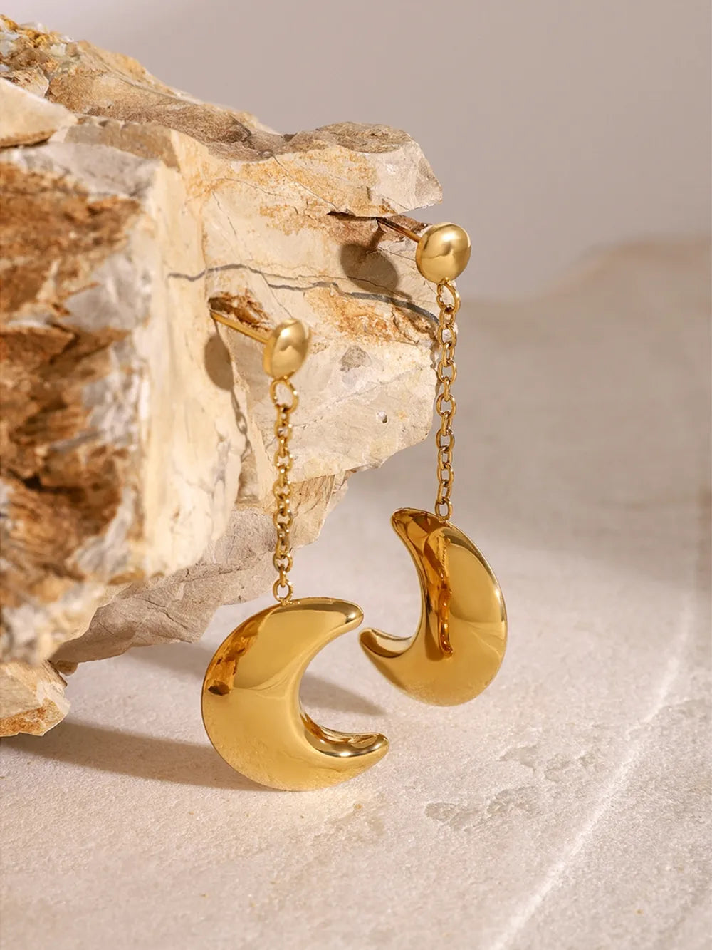 Gold celestial crescent drop earrings with chain detail