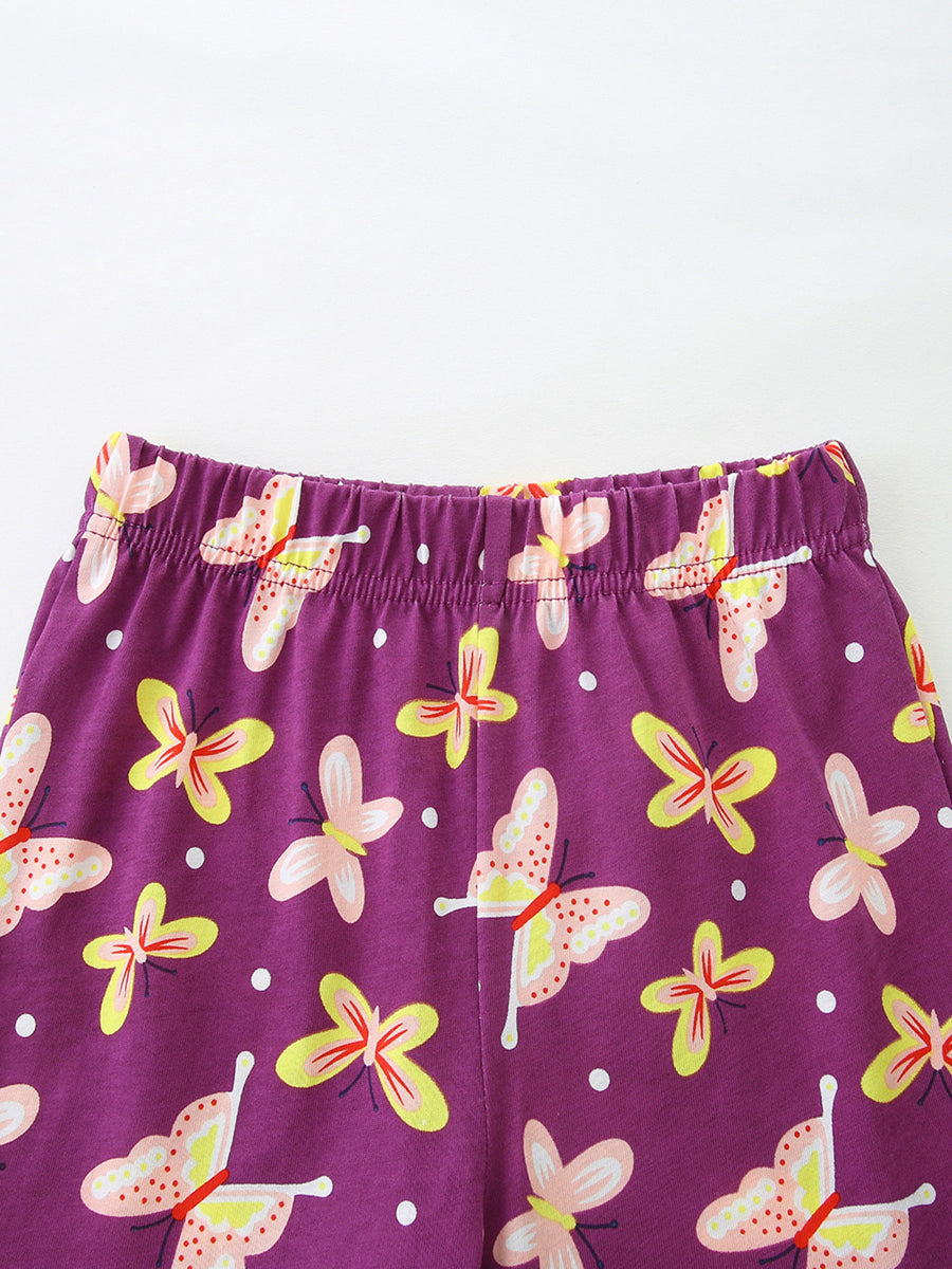 Purple cotton toddler girls' undershirt with allover butterfly print and ruffled sleeves.