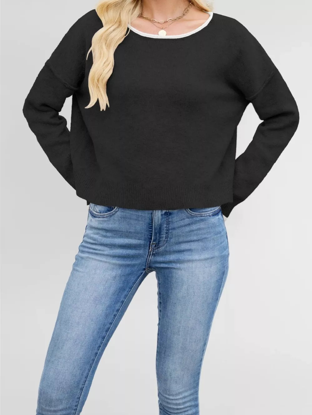 100% Acrylic Care instructions: Machine wash cold pullover sweater in Apricot with relaxed silhouette