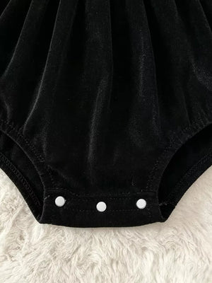 bodysuit in Black with graphic print and ruffled