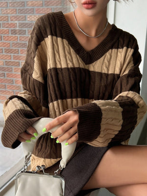 v-neck sweater featuring striped in Black with 100% polyester Care instructions: Machine wash cold texture