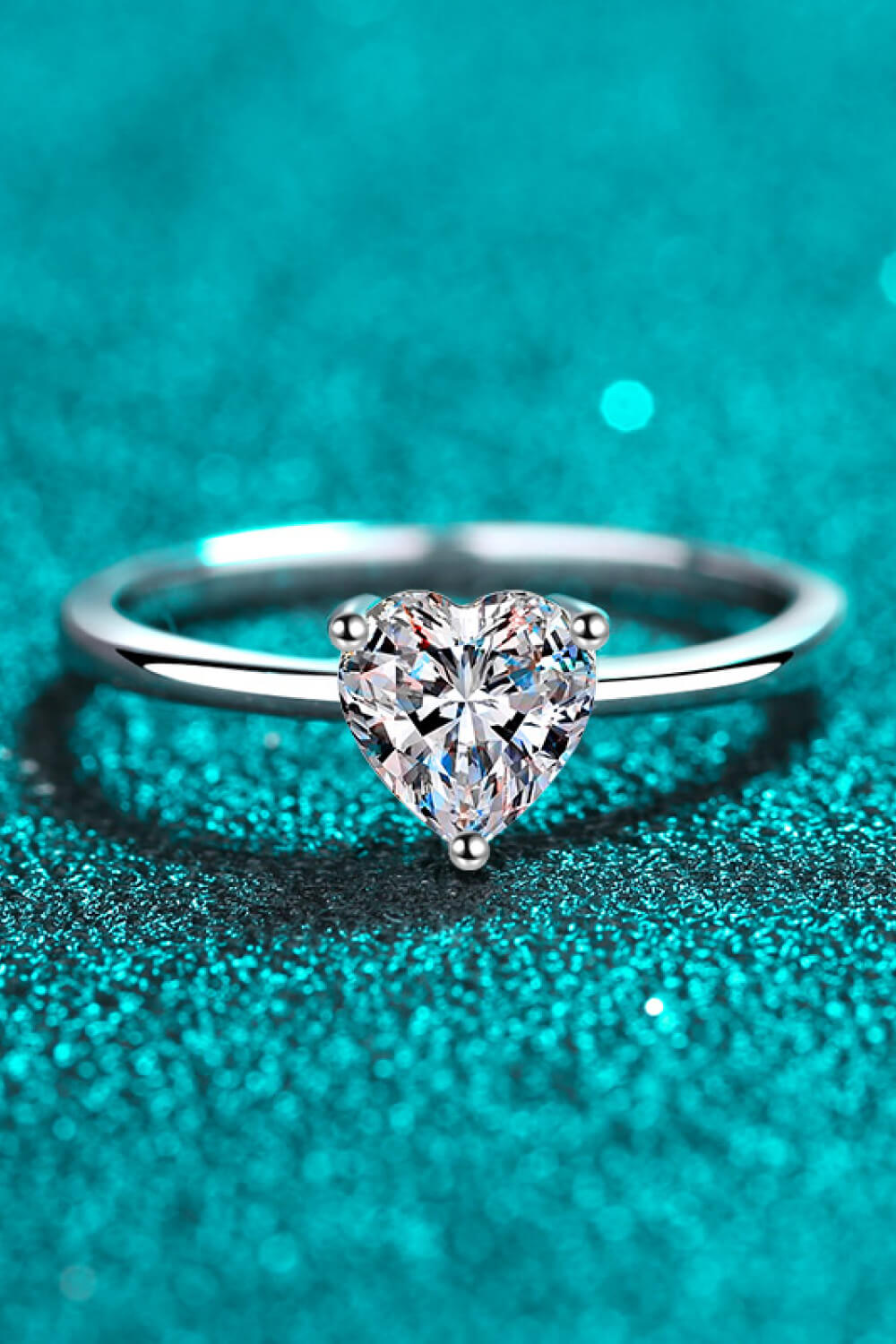 Silver ring with heart-cut moissanite solitaire stone