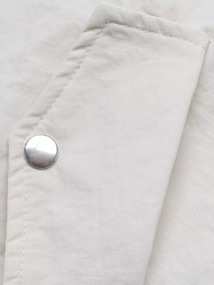 cream windbreaker with pocketed and long sleeve