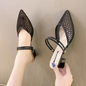 Black lace slingback pointed-toe mules with double ankle straps and block heel.