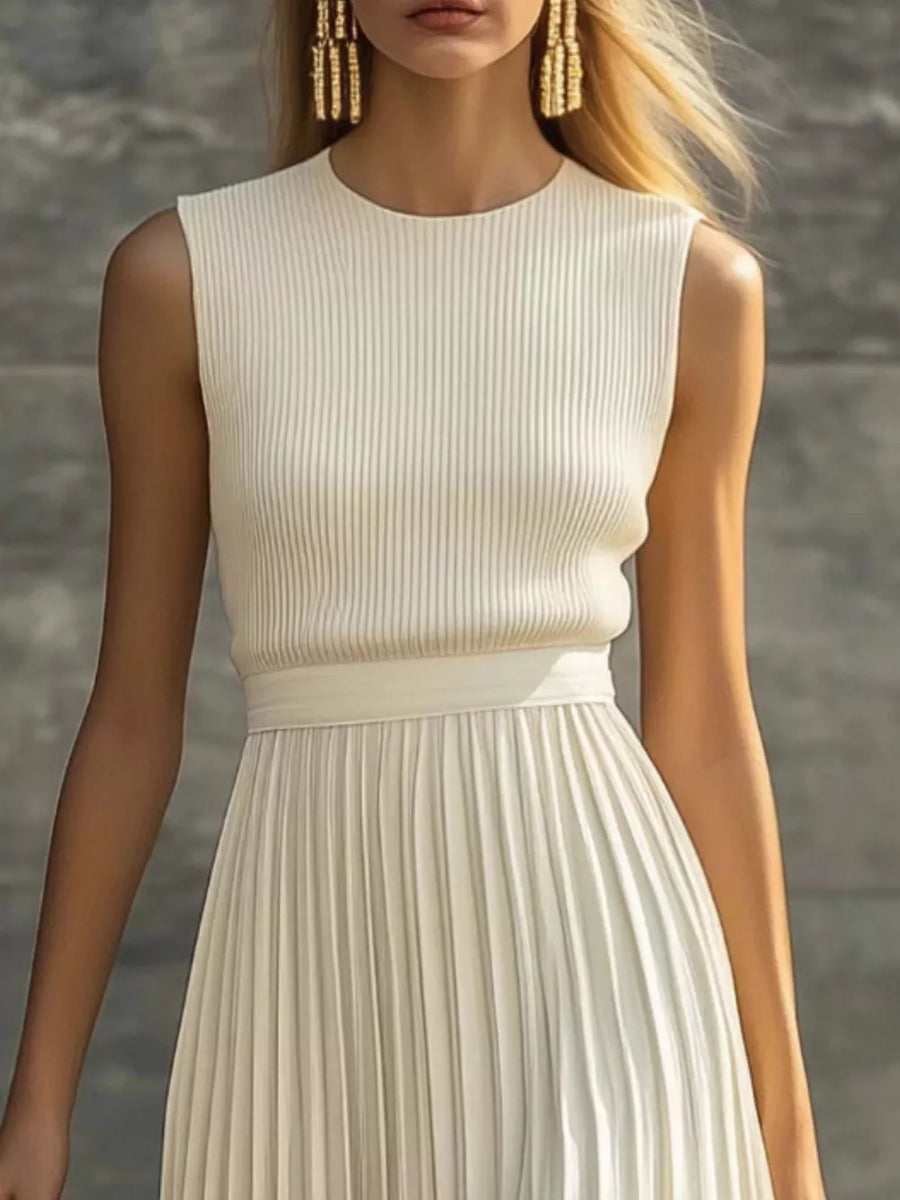 Beige maxi dress featuring ribbed and pleated
