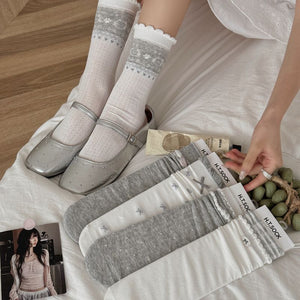 light gray socks featuring ribbed knit and solid, striped, polka dot, geometric, bow print