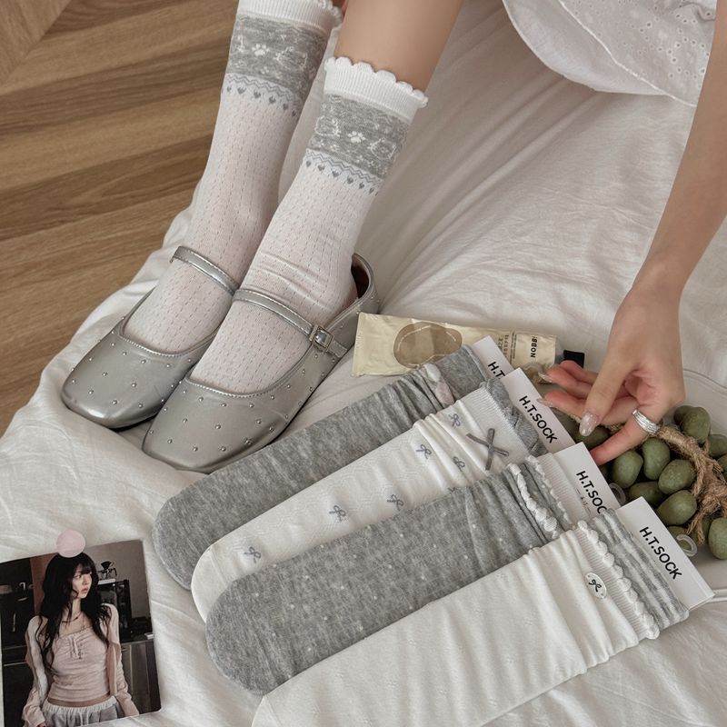 light gray socks featuring ribbed knit and solid, striped, polka dot, geometric, bow print