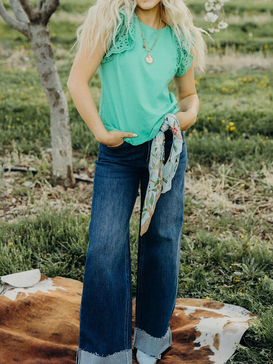 Green eyelet lace cap sleeve top with ruffled detail.