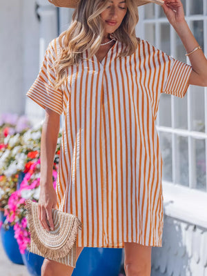 Striped V-neck shift mini dress with short sleeves in orange and white.