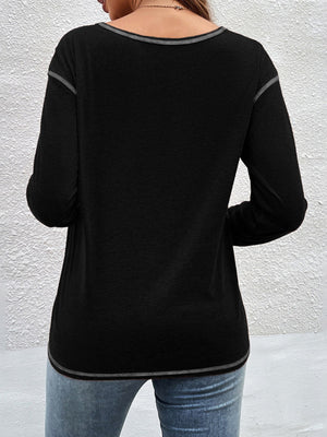 Burgundy t-shirt with decorative buttons and long sleeve