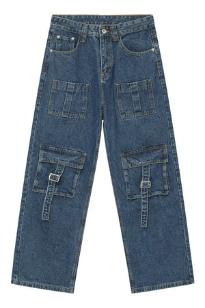 Medium wash denim cargo pants with buckle flap pockets and utility detailing.