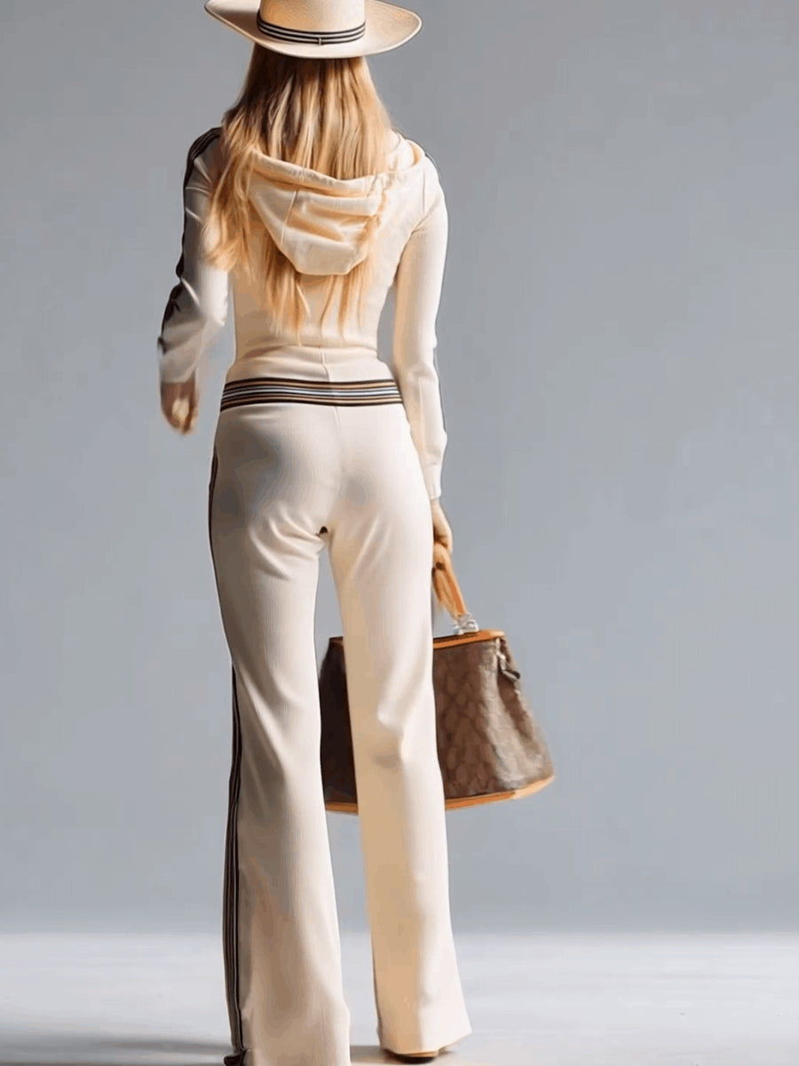 Milky white ribbed hooded jumpsuit with side stripe detail and elastic waistband.