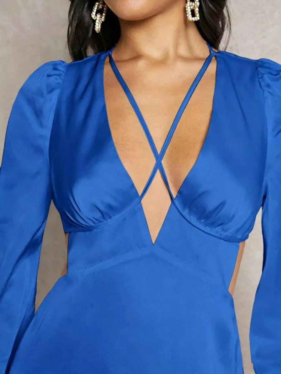 Blue satin mini dress with deep V-neck, criss-cross straps, cutouts and puff sleeves.