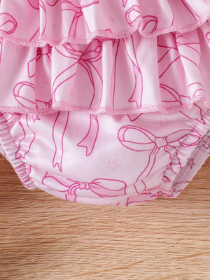 Pink baby bodysuit with bowknot print and ruffled tiers.