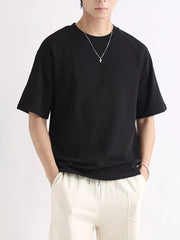 Black relaxed fit men's cotton t-shirt with crew neck and short sleeves