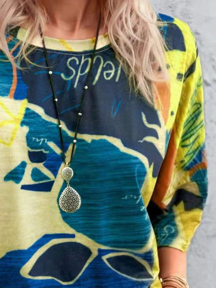 Brushstroke Stripe Casual T-Shirt in yellow and blue with abstract geometric pattern.
