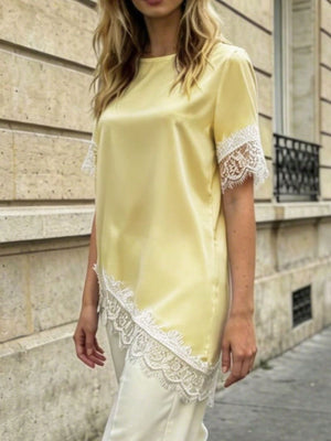 Yellow blouse with asymmetrical hem and short sleeve