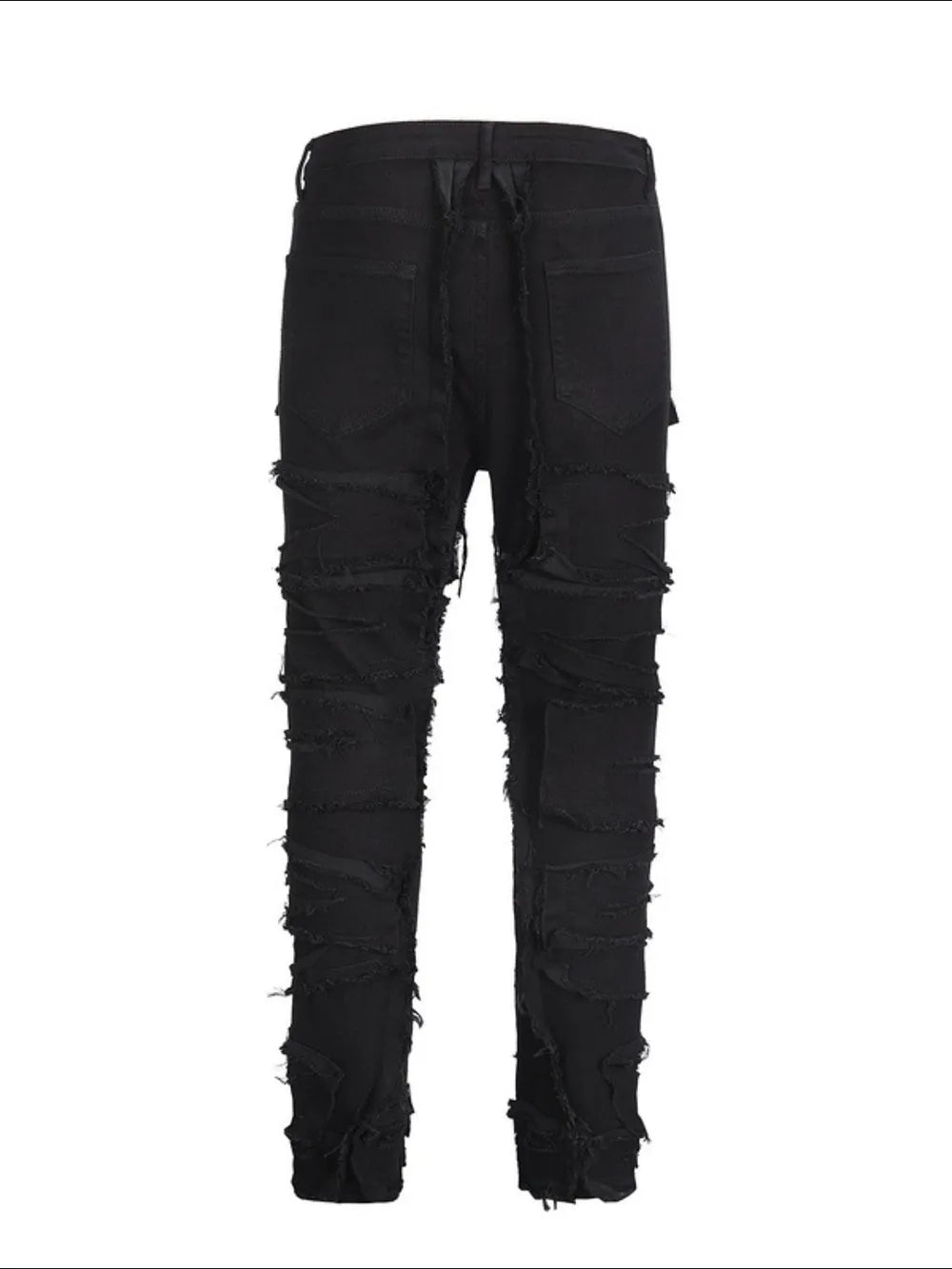 Black denim jeans with layered frayed details and a sculpted fit.