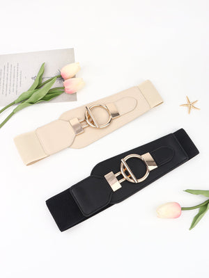 Black and cream elastic belts with gold D-ring buckles and alloy hardware.