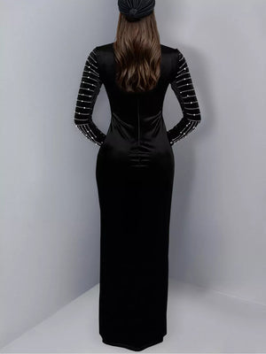 silver maxi dress featuring rhinestone embellishment and geometric