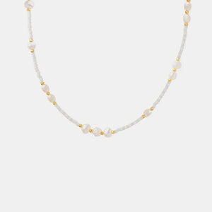 White seed bead necklace with lustrous pearls and gold accents