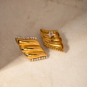 Gold sculptural wave crystal stud earrings with 18K gold plating