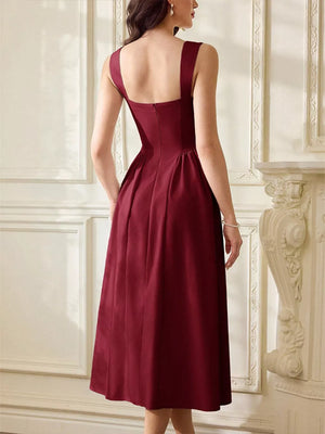 Burgundy a-line midi dress with sweetheart neckline and back zip.