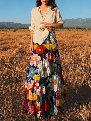 maxi skirt in dark blue featuring tiered and flared fit
