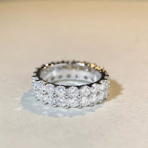 925 sterling silver,Moissanite Care instructions: Avoid wearing during exercise, ring in Silver with N/A silhouette