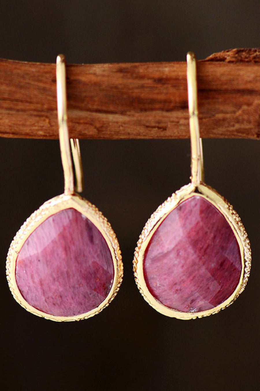 Textured teardrop gemstone drop earrings with gold-tone copper setting.
