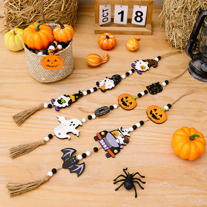Halloween charm trio garland with pumpkins, ghosts, bats, and gnomes on black and white beads.