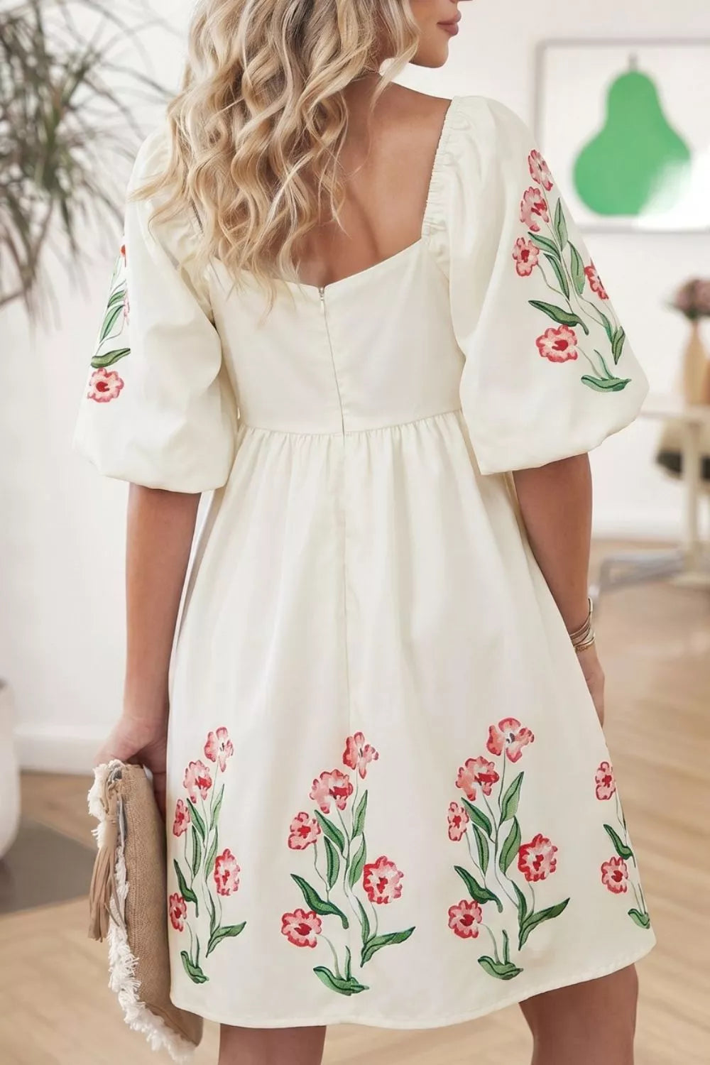Floral puff sleeve A-line dress with square neckline and embroidered flowers.
