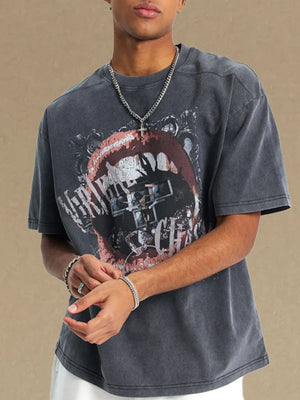 Graphic print washed cotton tee in dark gray with a bold lip graphic and distressed details.