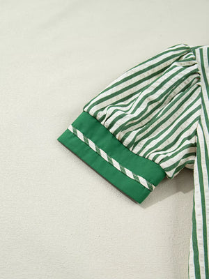Collared split neck blouse with green and white stripes, bubble sleeves, and contrast trim cuff.