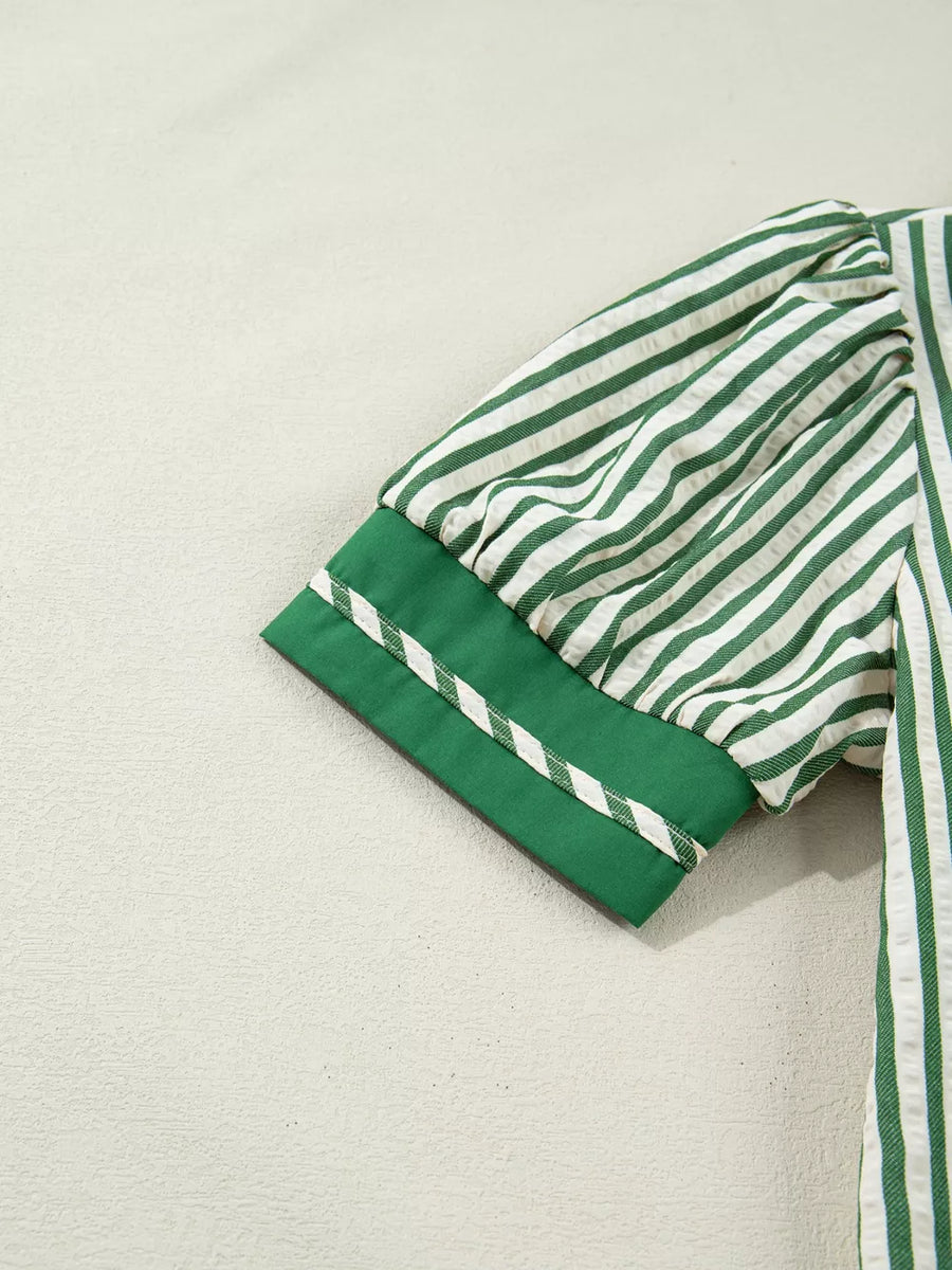 Collared split neck blouse with green and white stripes, bubble sleeves, and contrast trim cuff.