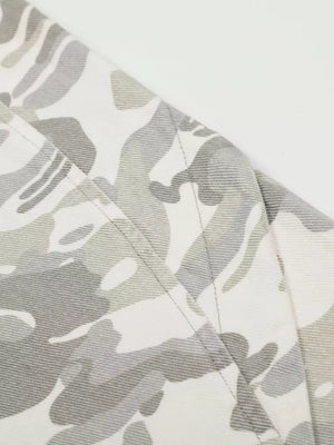 Men's camouflage wide-leg cargo pants in white and grey with visible stitching detail.