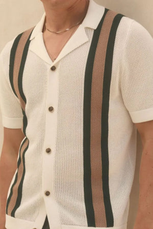 Ivory knit polo shirt with vertical stripe detail and button front
