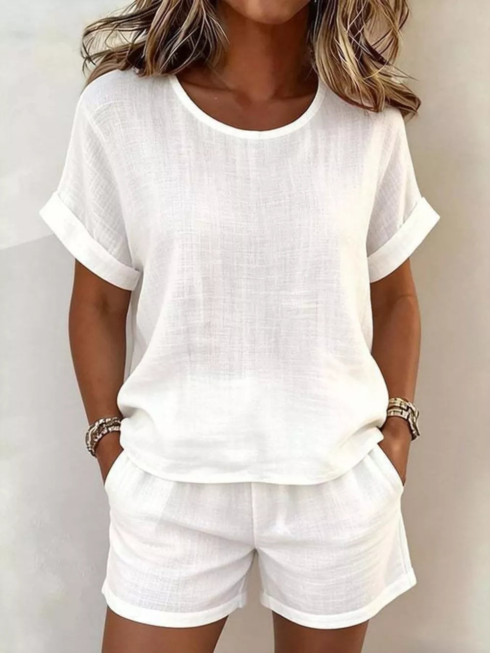lounge set in white featuring pocketed and relaxed fit