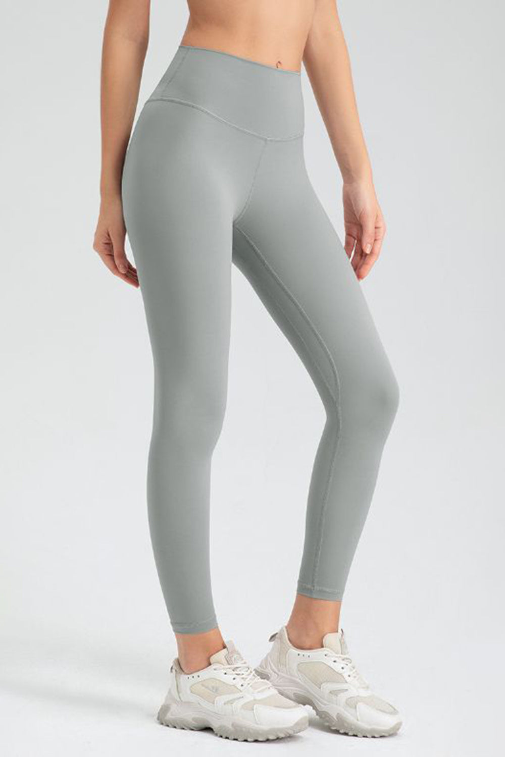 Performance leggings in Dusty Blue with sculpted seams and high waist.
