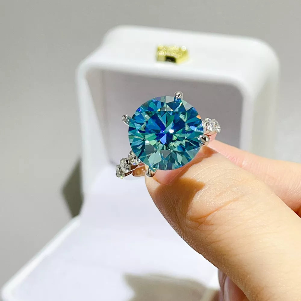 ring in teal featuring faceted stone and classic fit