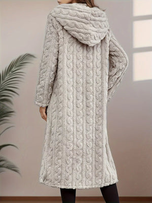 Gray hooded longline outerwear with cable knit texture and a soft, fuzzy finish.