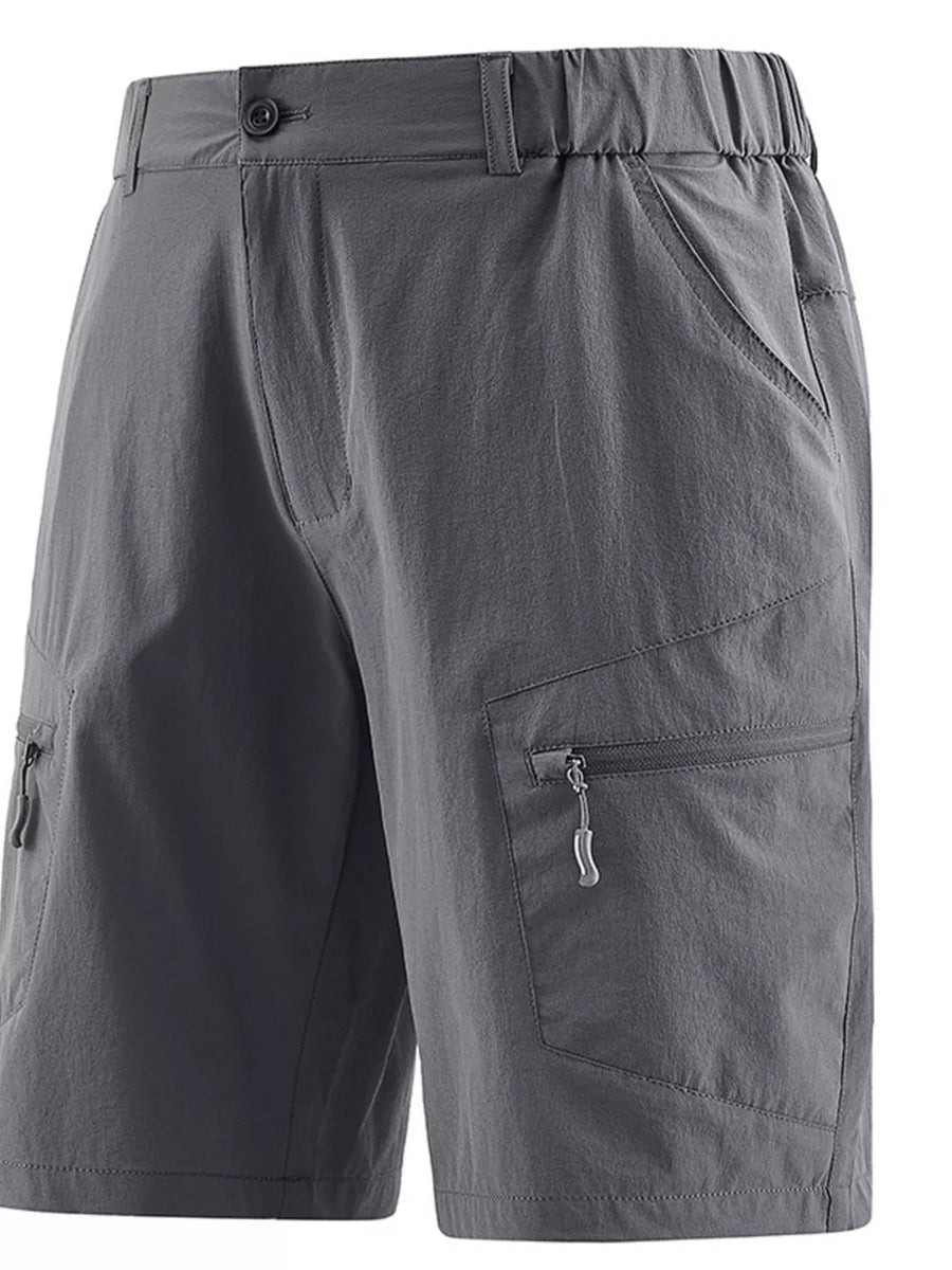 Lightweight gray cargo shorts for men with elastic waistband and zippered pockets.