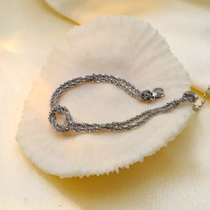 bracelet in silver with twisted and twisted chain