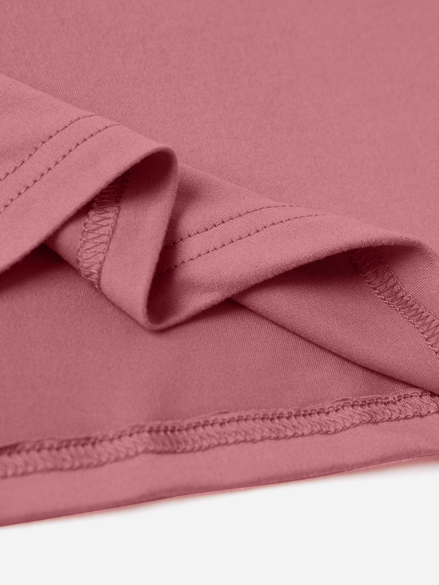 Dusty pink t-shirt with visible stitching detail at hem and sleeve.