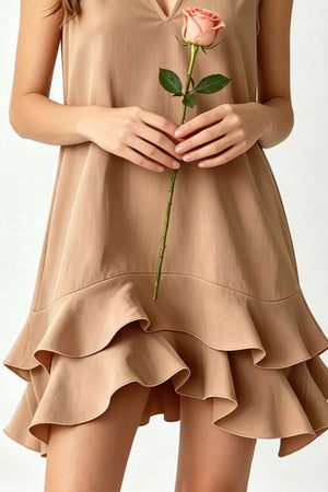 Tiered ruffle hem mini dress in taupe with V-neck.