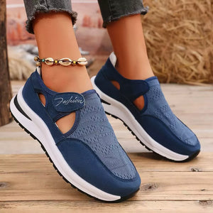 Blue cutout slip-on sneakers with white soles and a "Fashion" detail.