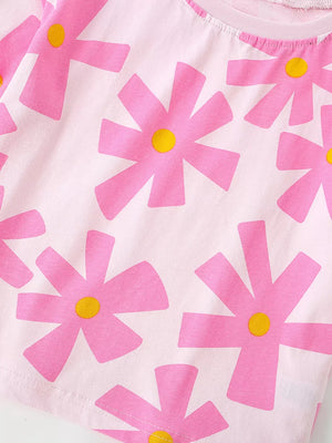 Pink cotton t-shirt for baby girls with a whimsical pink flower print and yellow centers.