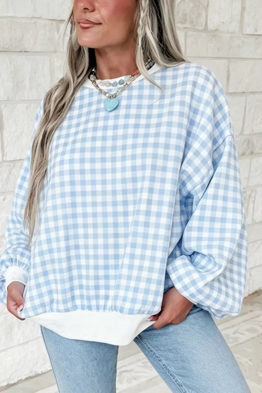 Blue and white gingham crewneck sweatshirt with white trim and balloon sleeves