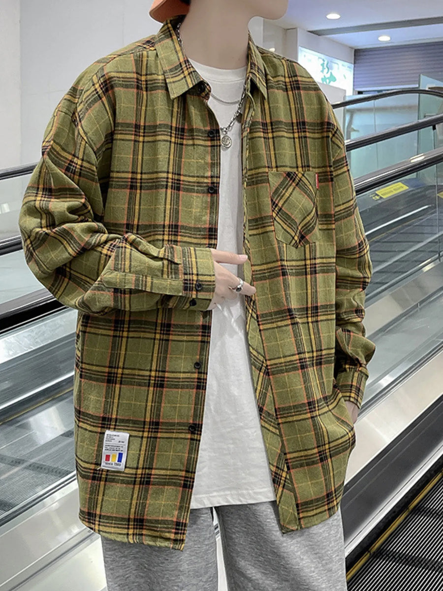 Plus-size green plaid long-sleeve button-up shirt with a chest pocket.