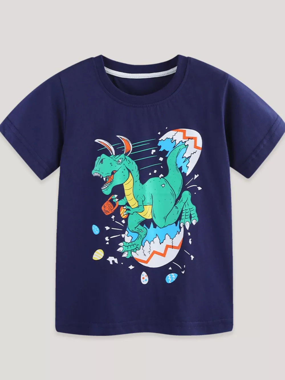 Navy cotton t-shirt with a graphic of a green dinosaur hatching from an egg with bunny ears.